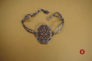 Bracelet with an Armenian ornament framed by silver