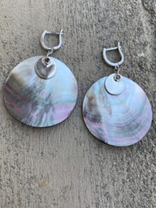 Silver earrings with natural snail shell