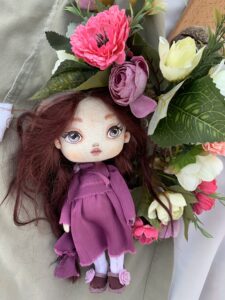Doll in purple