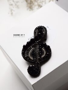 “The Black Clef” pin brooch