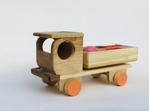 Wooden car with colorful blocks