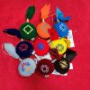 A collection box of embroidered souvenirs with Armenian ornaments (9 pieces)