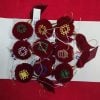 A collection box of embroidered souvenirs with Armenian ornaments (9 pieces)