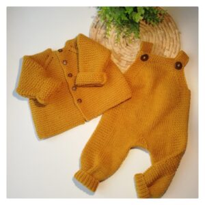 A set of baby jacket and suspender pants