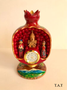 Pomegranate with clock,church and dolls
