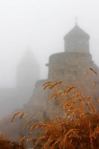 Photo. Tatev monastery in mist. Armenia.