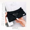 ARMLIN metallic black clutch