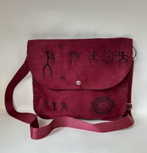 Maroon bag with Armenian petroglyphs
