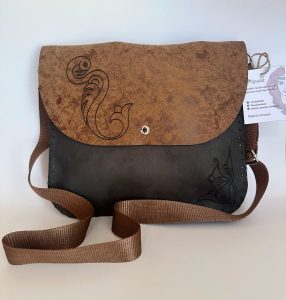Green-brown handmade bag with Armenian birdletter N