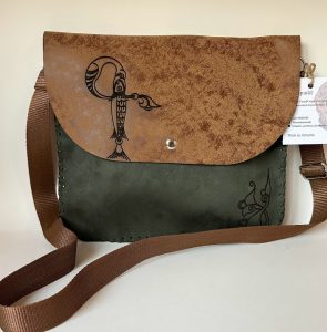 Green-brown handmade bag with Armenian birdletter G