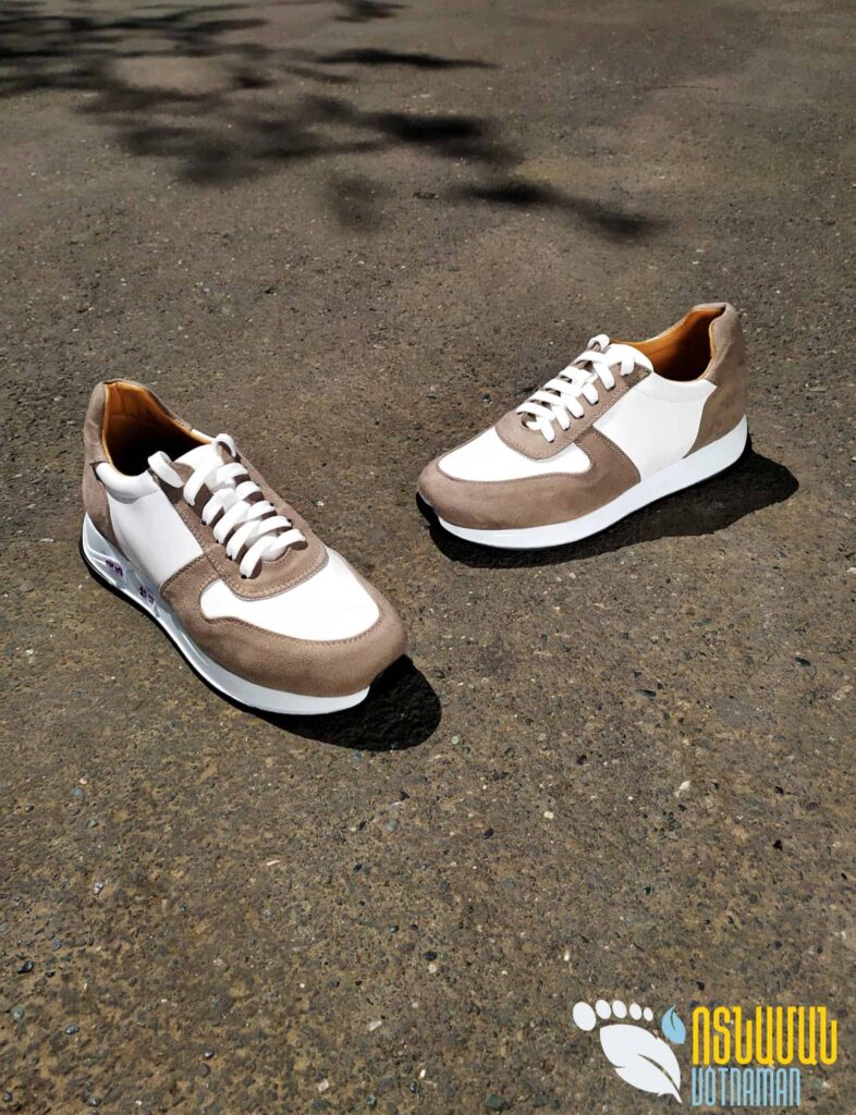 white and brown sneakers