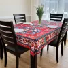 table cloth indoors with vase and plates
