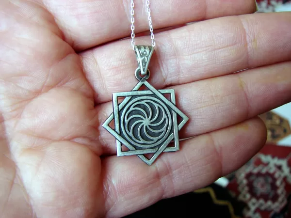 Sterling Silver Eight Pointed Star and Wheel of Eternity Pendant