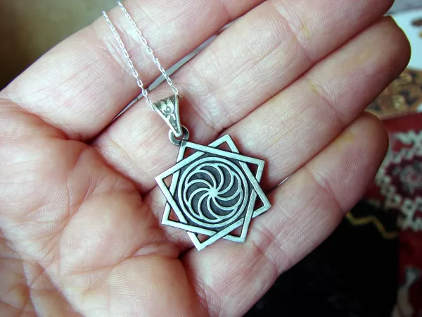 Sterling Silver Eight Pointed Star and Wheel of Eternity Pendant