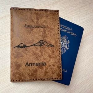 “Handmade brown passport case with laser-engraved Mount Ararat pattern, faux suede material, made in Armenia”